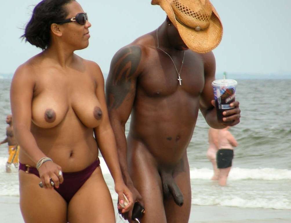 Ebony african girl handjob cock on beach
